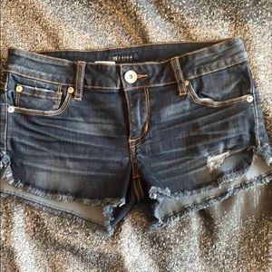 Jean shorts. Lightly distressed.